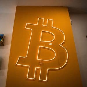 Bitcoin Dips Briefly Below $90,000 as Global Selloff Deepens