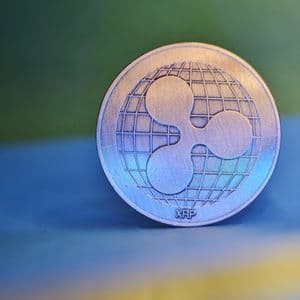 XRP Tests 200 EMA Breakout As Descending Channel Support Holds