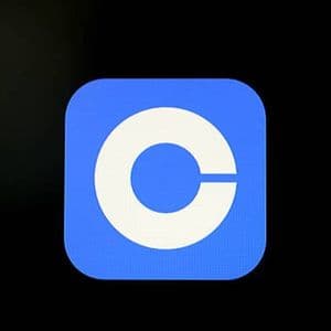 Coinbase Global cuts headcount by ~14%; stock climbs 4%